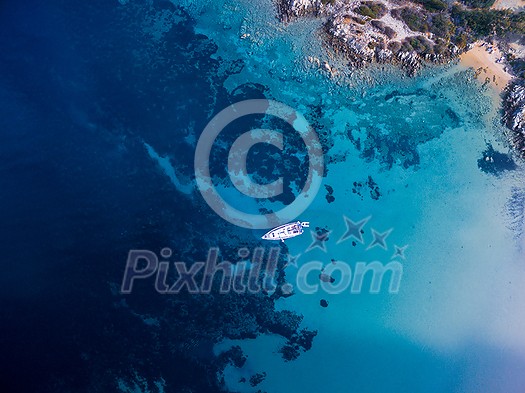 Scenic Sardinia island landscape. Italy sea ??coast with azure clear water. Nature background from above - aerial image