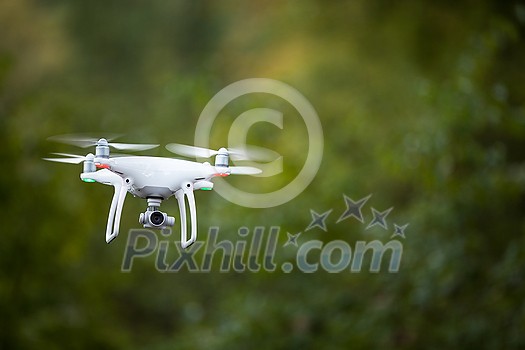 Quadrocopter drone with the camera in flight