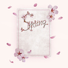 Cherry blossom letters on a vintage paper card with floating petals on soft pink backgound.