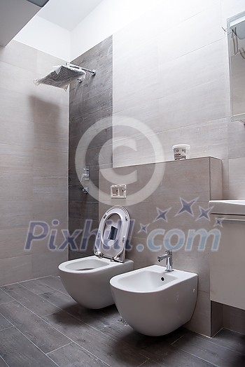 work in progress luxury stylish unfinished bathroom interior with toilet,bidet sink fancy shower on the wall work in progress luxury stylish unfinished bathroom interior with toilet,bidet sink fancy shower on the wall