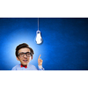 Idea concept with businessman with big head and light bulb hanging above 