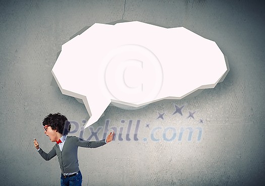 Funny young man with big head screaming emotional in mobile phone Funny young man with big head screaming emotional in mobile phone