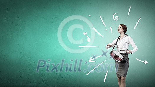 Young businesswoman on color background playing drums