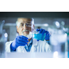 Senior male researcher carrying out scientific research in a lab (shallow DOF; color toned image)