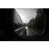 Cars on a highway at a rainy dusk (shallow DOF; color toned image)