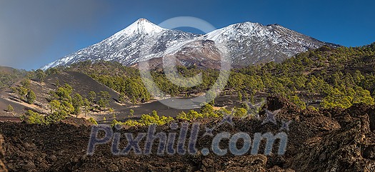 Peaks of Teide and Pico Viejo volcanoes at sunset seen from the Samara crater. Teide National Park, Tenerife, Canary Islands, Spain