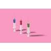 Medicinal set of vertical sterile disposable syrenges with colorful red, green and blue vaccines or serum for an intravenous injection on a pink background with shadows, copy space.