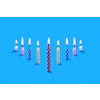 Greeting card from perspective composition of burning festive candles for cakes and sweet dessert on a blue background, copy space.