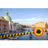 Prohibition yellow sign with model of Coronavirus molecule on a warning fencing ribbon on a blurred background of Grand Canal in Venice, Italy. Coronavirus, Covid 19 pandemic, Quarantine concept.