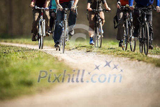 mixed group of cyclists biking mixed group of cyclists biking