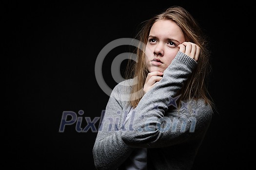 Distressed female teen - victim of domestic violence, abuse - in need of help and protection Distressed female teen - victim of domestic violence, abuse - in need of help and protection