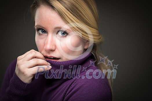 Fear/anxiety/regret/uncertainty in a young woman - effects of a difficult life situation - virus pandemic/confinement concept Fear/anxiety/regret/uncertainty in a young woman - effects of a difficult life situation - virus pandemic/confinement concept