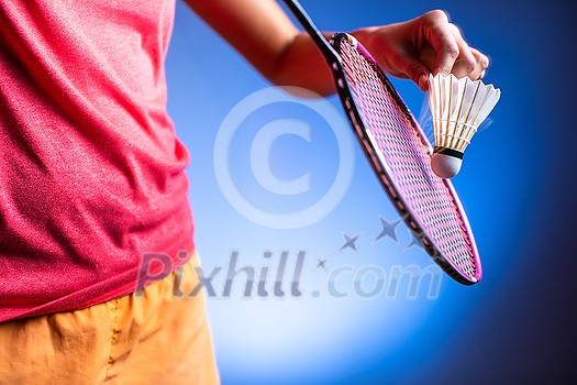 badminton racket and shuttlecock closeup