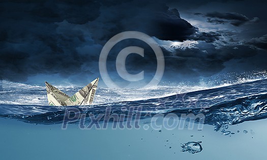 Ship made of dollar banknote sinking in water Ship made of dollar banknote sinking in water