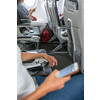 Passangers in abord a commercial flight using their cell phones during flight