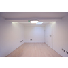 interior of empty room with hardwood floor,roof window and air conditioner on white wall ready for moving at new luxury apartment