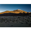 Peaks of Teide and Pico Viejo volcanoes at sunset seen from the Samara crater. Teide National Park, Tenerife, Canary Islands, Spain