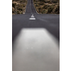 Long road in a mountain valley with a car on it - Teide National Park, Tenerife, Canary islands