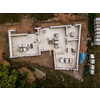 Aerial image of a new family house being built. New private housing development construction in rural countryside aerial view.