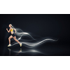 Young woman athlete running fast on dark background 