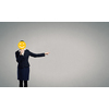 Unrecognizable businesswoman hiding her face behind mask and showing direction