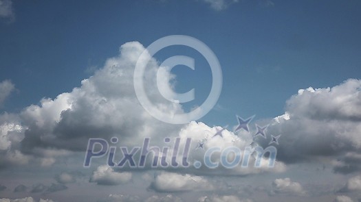 Sunny beautiful cloudyscape on a blue sky background. 4K Timelapse motion of white fluffy cumulus clouds . 4K UHD video 3840, 2160p. Sunny beautiful cloudyscape on a blue sky background. 4K Timelapse motion of white fluffy cumulus clouds . 4K UHD video 3840, 2160p.