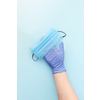 Medical antibacterial protective face mask on a woman's hand in rubber glove on a light blue background from masks. Concept of prevention from respiratory sickness and viruses.