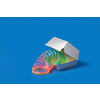 Plastic rainbow spring slinky toy in a silver colored food container on a blue background with soft shadows, copy space.