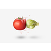 Creative vegan composition from fresh natural organic cabbage in the shape of boxing glove punching red tomato vegetable with splash on a white background, copy space. Vegan healthy food concept.