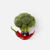 Creative composition in the shape of funny face made from freshly picked natural organic vegetables on a white background, copy space. Vegan healthy food concept.