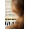 Playing Piano (shallow DOF; color toned image)