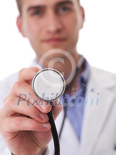 Portrait of hero in white coat. Cheerful smiling young doctor with stethoscope in medical hospital standing against white background. Coronavirus covid-19 danger alert Portrait of hero in white coat. Cheerful smiling young doctor with stethoscope in medical hospital standing against white background. Coronavirus covid-19 danger alert