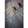 City business people crossing a street - motion blurred abstract background