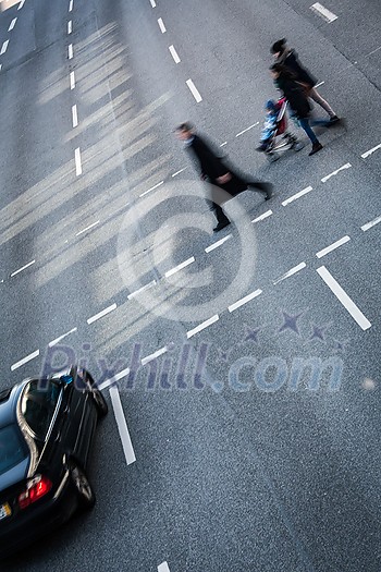 City business people crossing a street - motion blurred abstract background City business people crossing a street - motion blurred abstract background