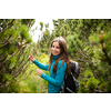 Pretty, young woman hiking outdoors in splendid alpine setting