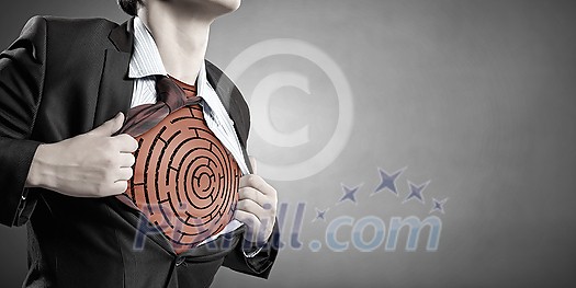 Businessman opening his shirt on chest acting like super hero Businessman opening his shirt on chest acting like super hero
