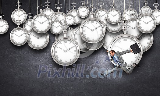 Concept of time with funny businessman running in a hurry Concept of time with funny businessman running in a hurry