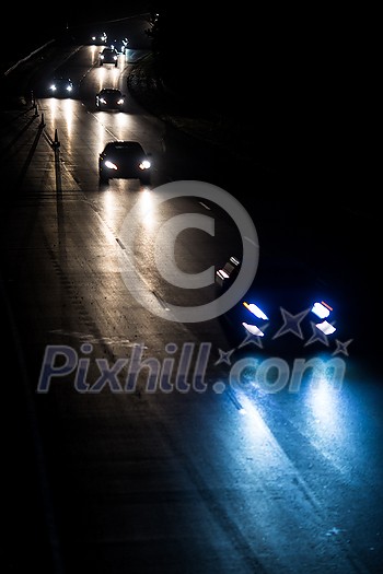 Busy highway at night with cars of commuters going home from work