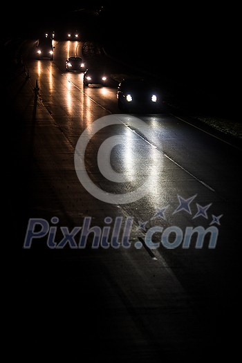 Busy highway at night with cars of commuters going home from work Busy highway at night with cars of commuters going home from work