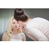 Beautiful bride with fashion wedding hairstyle. Closeup portrait of young gorgeous bride. Wedding Studio shot (color toned image; shallow DOF)