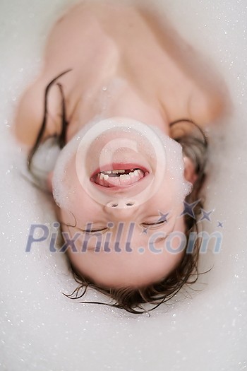 little girl playing with soap foam in bath during coronavirus stay at home pandemic quarantine little girl playing with soap foam in bath during coronavirus stay at home pandemic quarantine