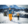 Winter sports - two friends hiking with snowshoes in high mountains