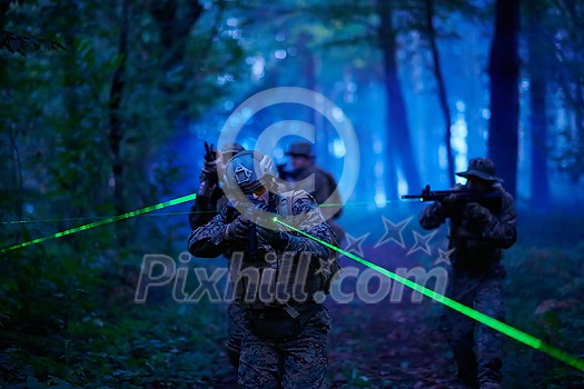 soldiers squad in action on night mission using laser sight beam lights military team concept soldiers squad in action on night mission using laser sight beam lights military team concept