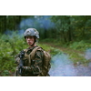 woman soldier ready for battle wearing protective military gear and weapon