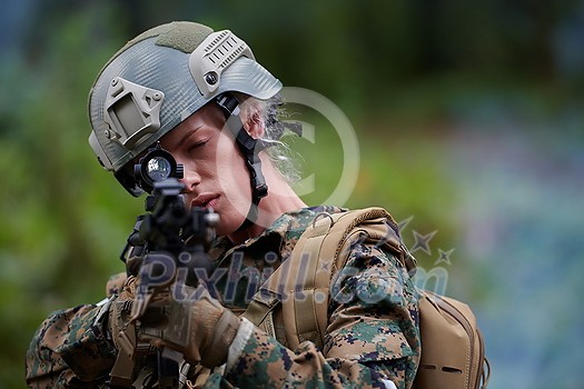 woman soldier ready for battle wearing protective military gear and weapon woman soldier ready for battle wearing protective military gear and weapon