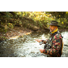 Fly fisherman fly fishing on a splendid mountain river