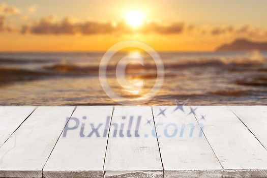 Empty perspective, white wooden boards or countertop against blurred seascape with sunset on background. Use as template and mockup for display or montage of your products. Close up, copy space Empty perspective, white wooden boards or countertop against blurred seascape with sunset on background. Use as template and mockup for display or montage of your products. Close up, copy space