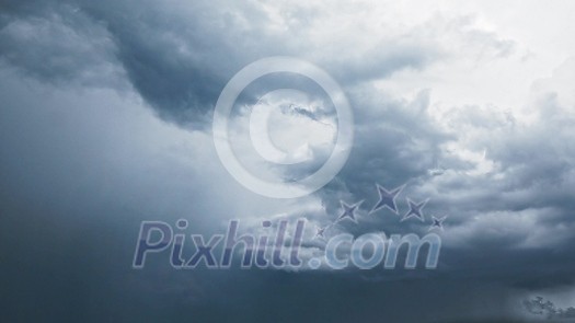 Fast moving dark blue rainy clouds before storm on a background of dramatic sky with lightnings. 4K hyperlapse moving, timelapse. 3840, 2160p.