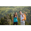 Pretty, young woman hiking outdoors in splendid alpine setting