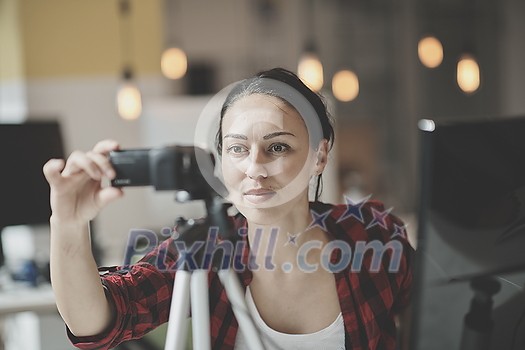 video blogger millenial business woman making live video show presentation or tutorial